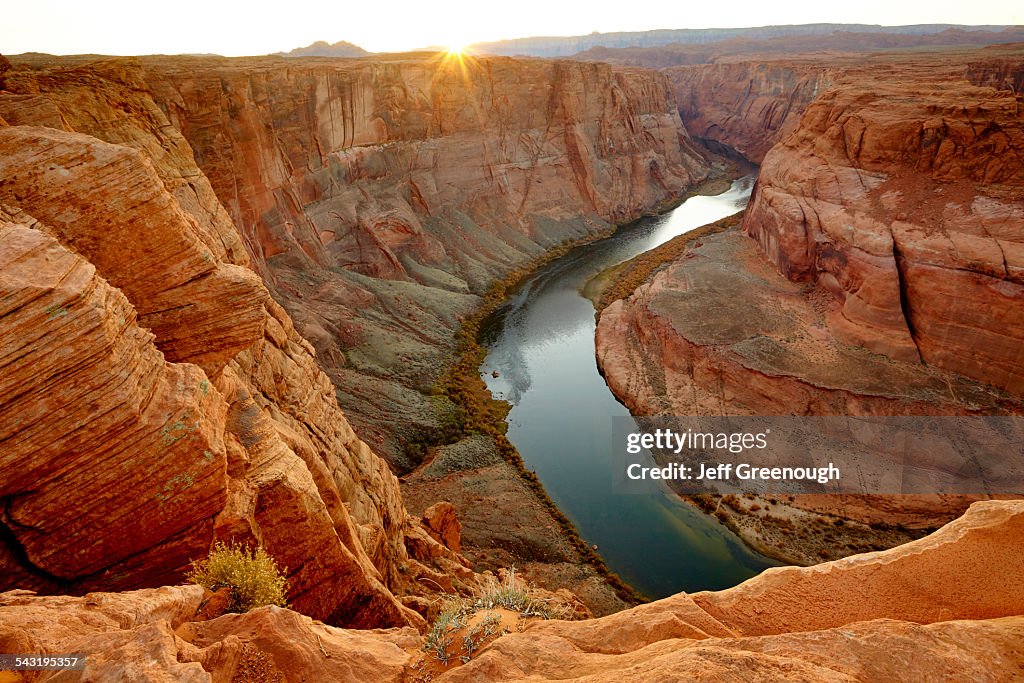 River winding through majestic rock formations in desert landscape, Page, Arizona, United States