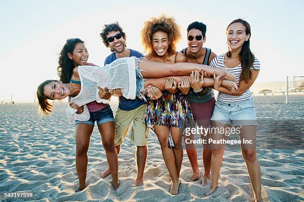 2,490 Funny Group On Beach Photos and Premium High Res Pictures - Getty  Images
