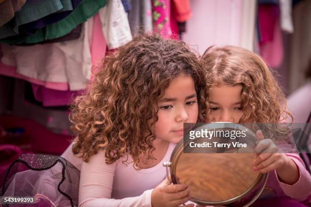 close up of girls admiring themselves in mirror - girls playing with themselves bildbanksfoton och bilder