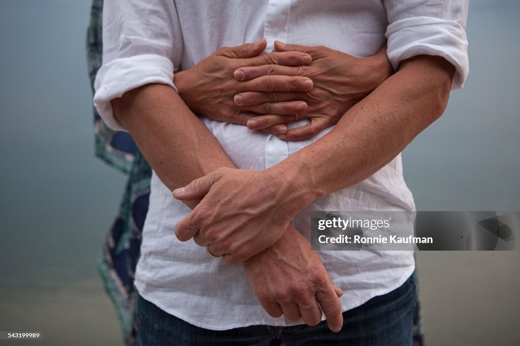 Close up of Caucasian couple hugging