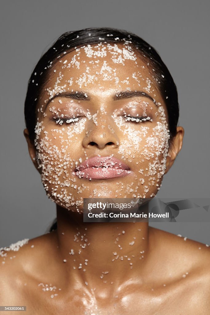 Female models face covered in sugar