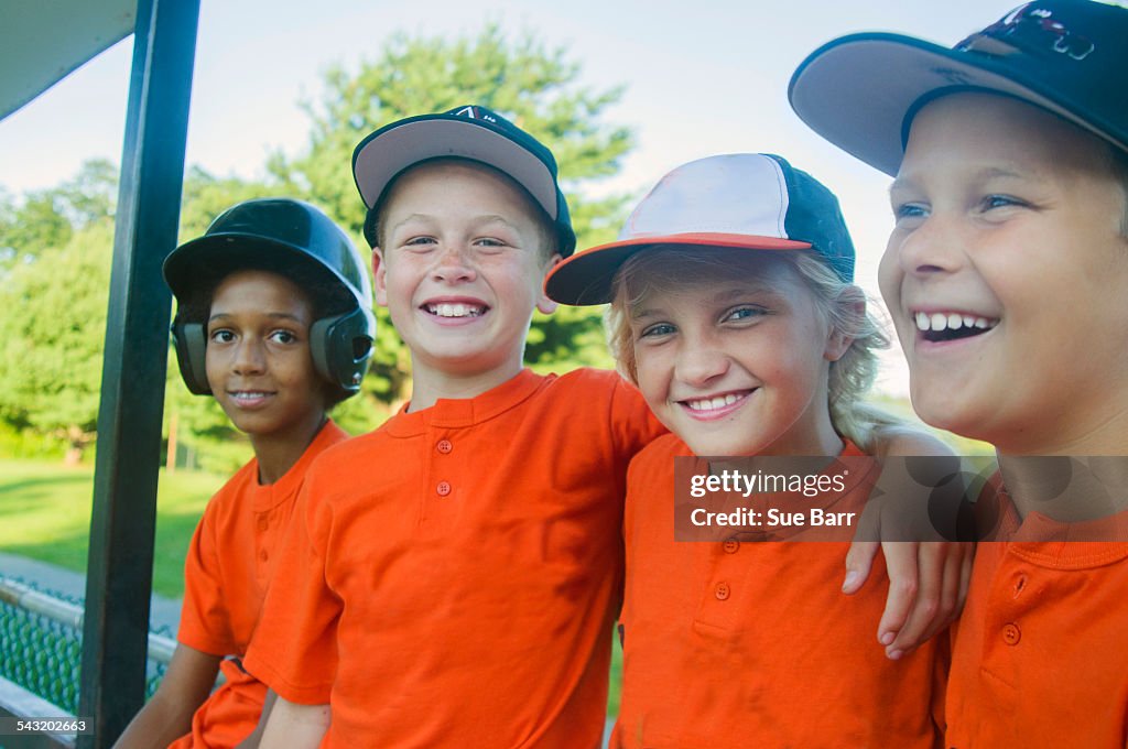 Young baseball players waiting to play