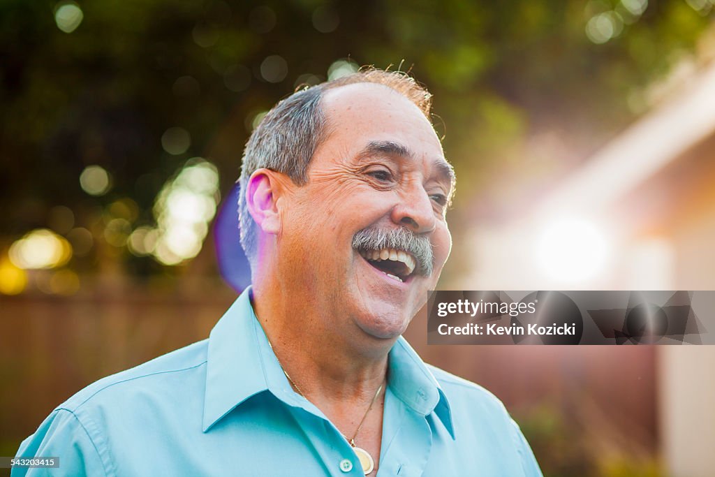 Portrait of senior man with wide smile