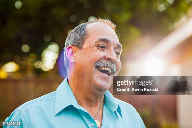 portrait of senior man with wide smile - 60 64 years stock pictures, royalty-free photos & images