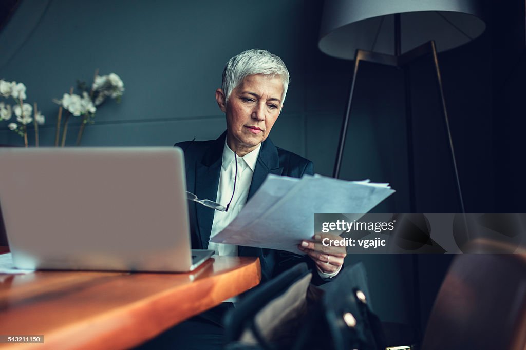 Mature Businesswoman In Her Office.