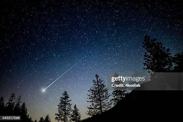 starry night - shooting star stock pictures, royalty-free photos & images