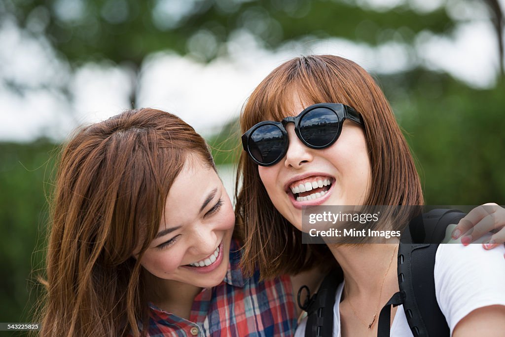 Two young women in the park.