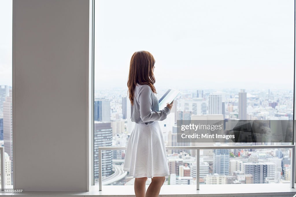 A working woman in an office building.