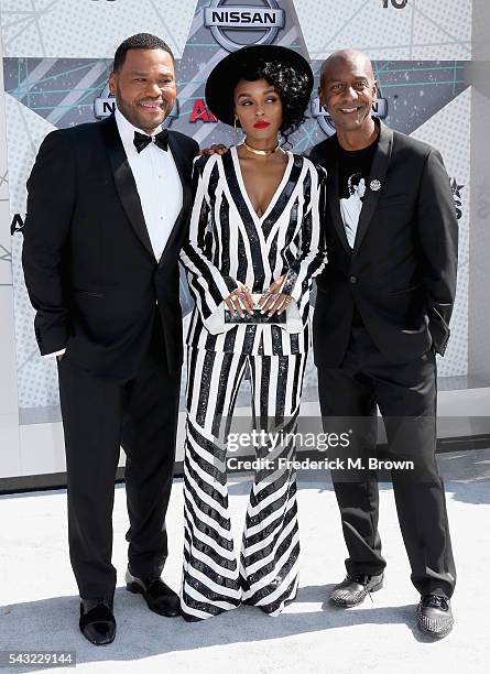 Host Anthony Anderson, singer Janelle Monae and Specials President Stephen G. Hill attend the 2016 BET Awards at the Microsoft Theater on June 26,...