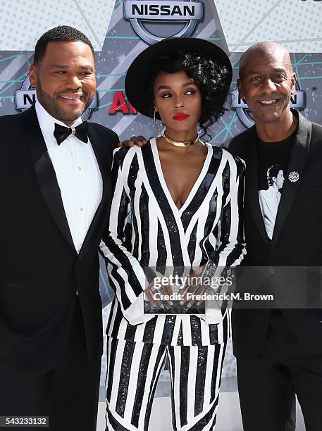 Host Anthony Anderson, singer Janelle Monae and Specials President Stephen G. Hill attend the 2016 BET Awards at the Microsoft Theater on June 26,...