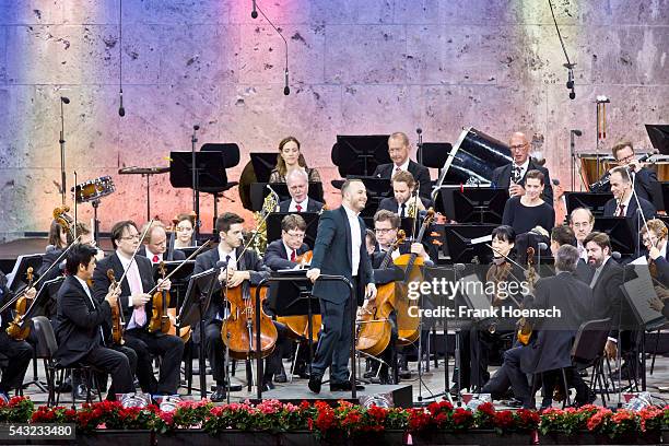 Berliner Philharmoniker with Canadin director Yannick Nezet-Seguin perform live during a concert at the Waldbuehne on June 26, 2016 in Berlin,...