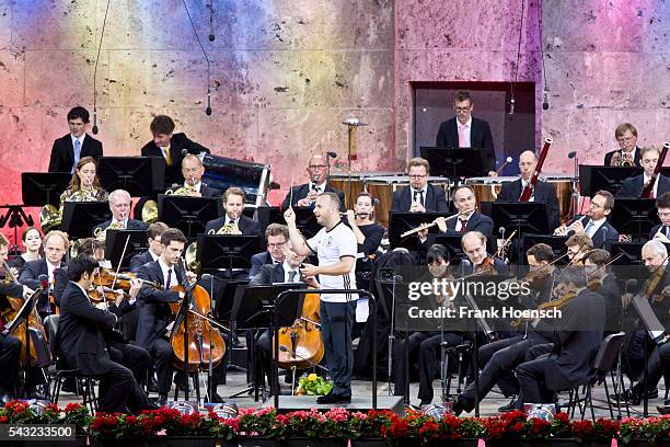 Berliner Philharmoniker with Canadin director Yannick Nezet-Seguin perform live during a concert at the Waldbuehne on June 26, 2016 in Berlin,...