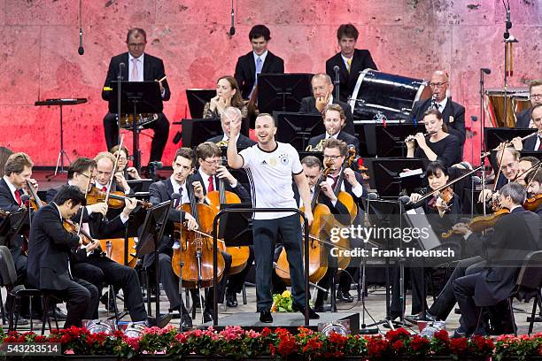 Berliner Philharmoniker with Canadin director Yannick Nezet-Seguin perform live during a concert at the Waldbuehne on June 26, 2016 in Berlin,...