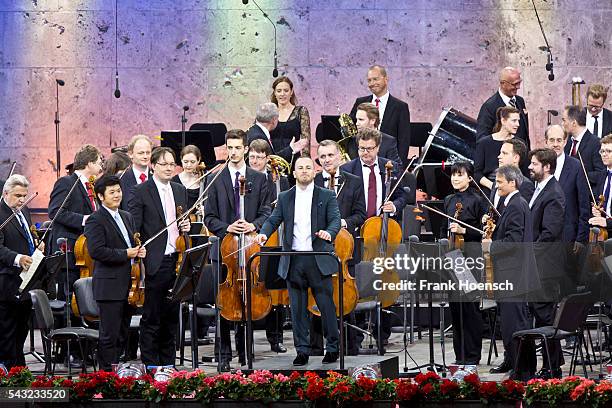 Berliner Philharmoniker with Canadin director Yannick Nezet-Seguin perform live during a concert at the Waldbuehne on June 26, 2016 in Berlin,...