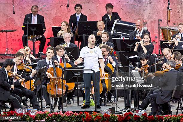 Berliner Philharmoniker with Canadin director Yannick Nezet-Seguin perform live during a concert at the Waldbuehne on June 26, 2016 in Berlin,...