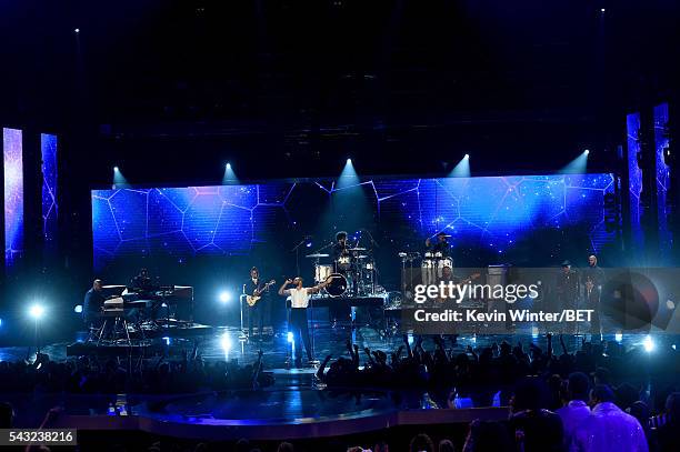 Recording artist Bilal performs with The Roots onstage during the 2016 BET Awards at the Microsoft Theater on June 26, 2016 in Los Angeles,...