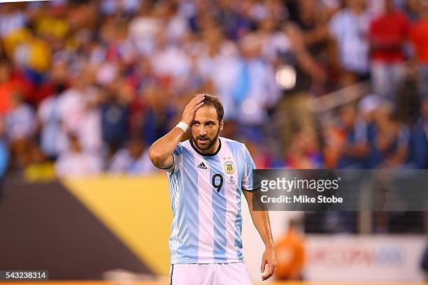 Gonzalo Higuain of Argentina reacts after missing a scoring chance against Chile during the Copa America Centenario Championship match at MetLife...