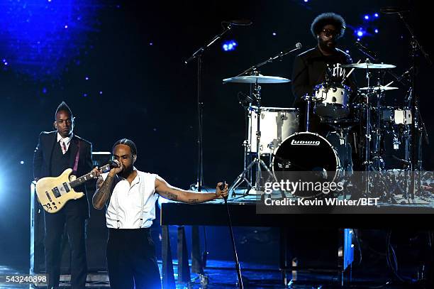 Recording artists Captain Kirk Douglas, Bilal and Questlove perform onstage during the 2016 BET Awards at the Microsoft Theater on June 26, 2016 in...