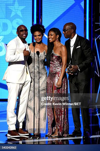 Actor Omar Epps, actress Kimberly Elise, actress Gabrielle Union, and actor J. B. Smoove accept the Best Male Hip Hop Artist award on behalf of...