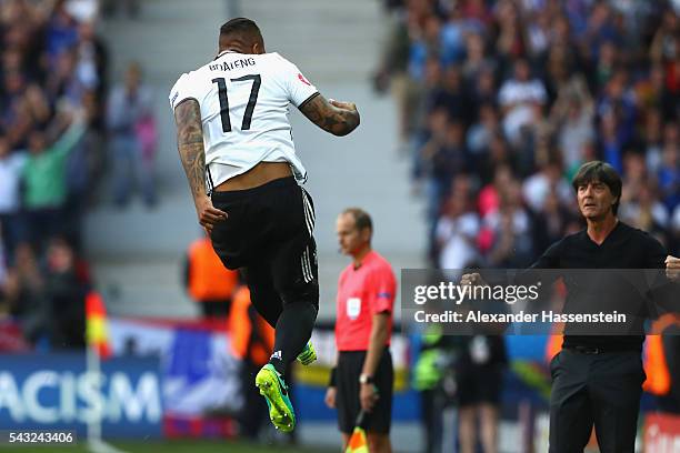 Jerome Boateng of Germany celebrates scoring the opening goal during the UEFA EURO 2016 round of 16 match between Germany and Slovakia at Stade...