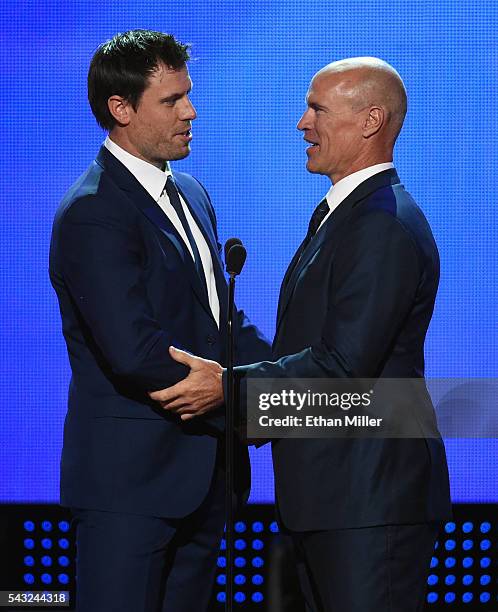 Shea Weber of the Nashville Predators accepts the Mark Messier NHL Leadership Award from Hockey Hall of Fame member Mark Messier during the 2016 NHL...