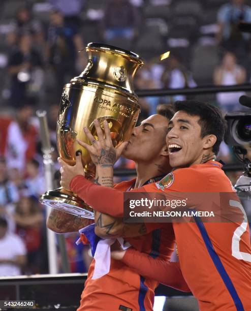 Chile's Eduardo Vargas kisses the trophy after winning the Copa America Centenario final by defeating Argentina in the penalty shoot-out in East...