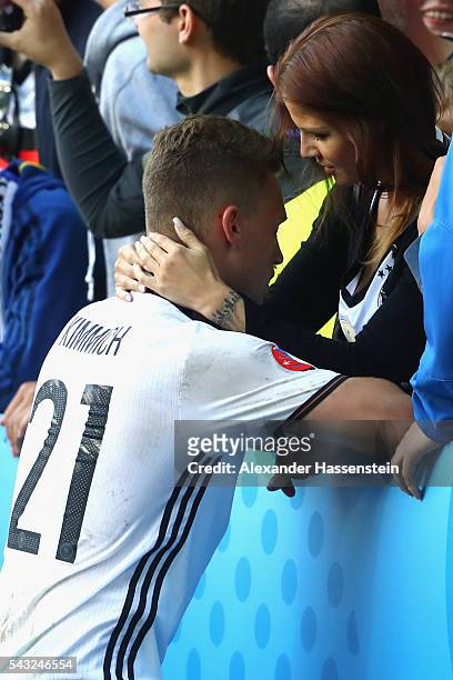 Joshua Kimmich of Germany kisses his girlfriend Lina Meyer after the UEFA EURO 2016 round of 16 match between Germany and Slovakia at Stade...