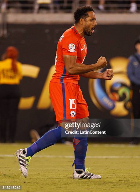 Jean Beausejour of Chile reacts to his penalty shootout goal during the penalty shootout the championship match between Argentina and Chile at...