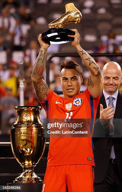 Eduardo Vargas of Chile holds up the Golden Boot Award following the championship match between Argentina and Chile at MetLife Stadium as part of...