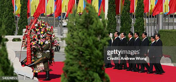 Chinese Premier Wen Jiabao and President Hu Jintao and other Politburo members lay wreaths at the Monument to the People's Heroes during a memorial...