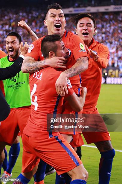 Gary Medel, Mauricio Isla and Erick Pulgar of Chile celebrate after winning the championship match between Argentina and Chile at MetLife Stadium as...