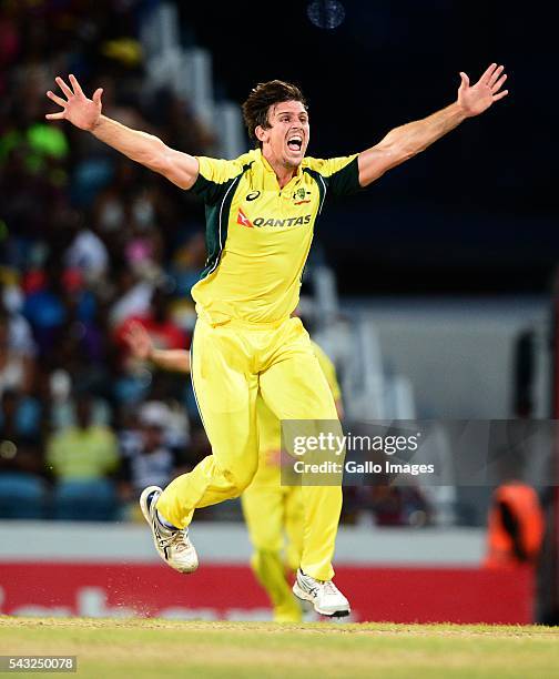 Mitchell Marsh of Australia celebrates the wicket of Johnson Charles of the West Indies during the Tri-Nation Series One-day International Final...