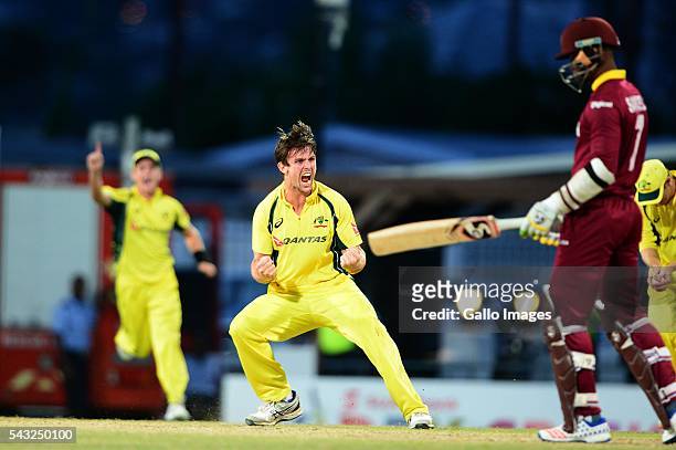 Mitchell Marsh of Australia celebrates the wicket of Marlon Samuels of the West Indies during the Tri-Nation Series One-day International Final...