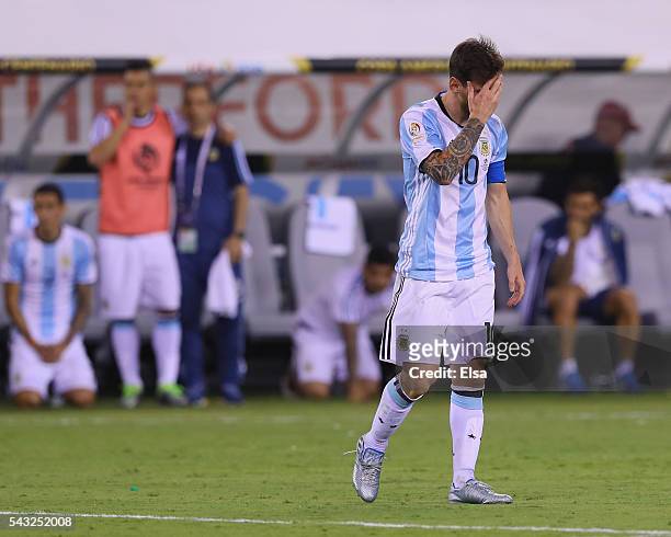 Lionel Messi of Argentina reacts after he missed a penalty kick against Chile during the Copa America Centenario Championship match at MetLife...