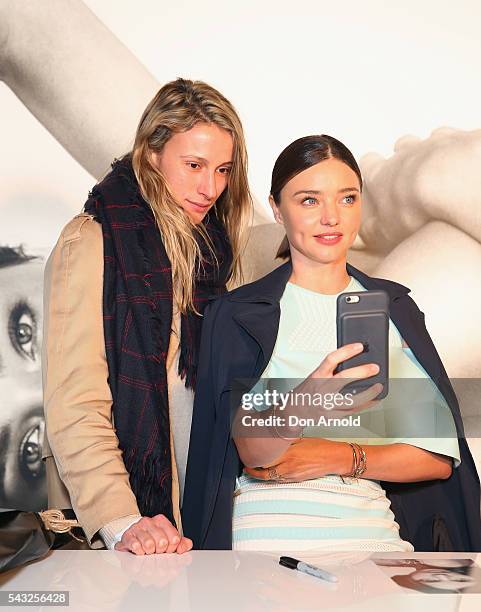 Miranda Kerr takes a selfie with fans at Westfield,Sydney on June 27, 2016 in Sydney, Australia.