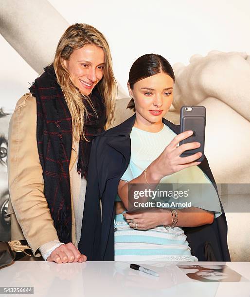 Miranda Kerr takes a selfie with fans at Westfield,Sydney on June 27, 2016 in Sydney, Australia.