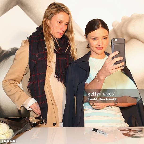 Miranda Kerr takes a selfie with fans at Westfield,Sydney on June 27, 2016 in Sydney, Australia.