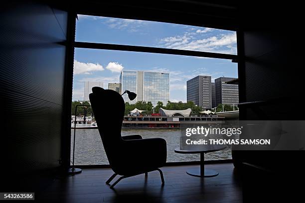 Picture taken on June 23, 2016 shows the Off-Paris Seine floating hotel is pictured on the river Seine in Paris. The Off-Paris Seine hotel, which was...