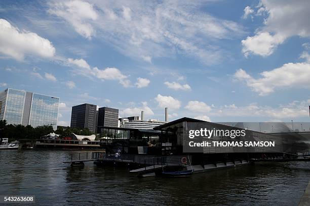 Picture taken on June 23, 2016 shows the Off-Paris Seine floating hotel is pictured on the river Seine in Paris. The Off-Paris Seine hotel, which was...