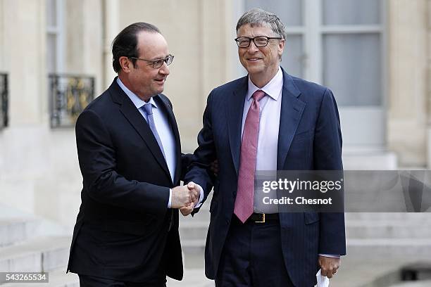 French President Francois Hollande welcomes Bill Gates, the co-Founder of the Microsoft company and co-Founder of the Bill and Melinda Gates...