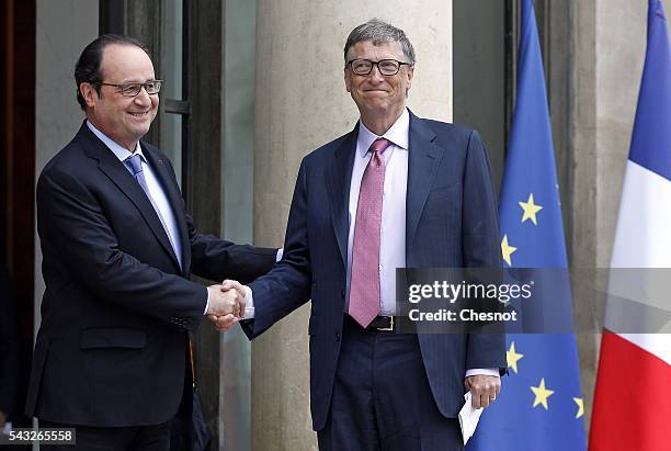 French President Francois Hollande welcomes Bill Gates, the co-Founder of the Microsoft company and co-Founder of the Bill and Melinda Gates...
