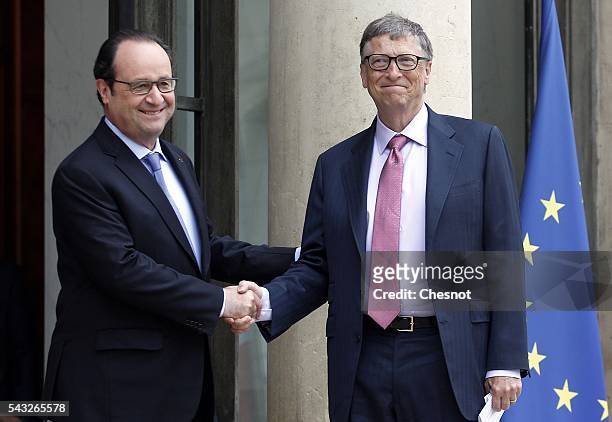 French President Francois Hollande welcomes Bill Gates, the co-Founder of the Microsoft company and co-Founder of the Bill and Melinda Gates...