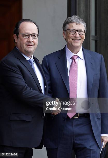 French President Francois Hollande welcomes Bill Gates, the co-Founder of the Microsoft company and co-Founder of the Bill and Melinda Gates...