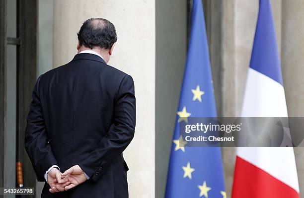 French President Francois Hollande leaves after his meeting with Bill Gates, the co-Founder of the Microsoft company and co-Founder of the Bill and...