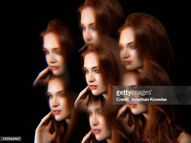 multiple exposure of female, with long hair - multiple images of the same woman stock pictures, royalty-free photos & images