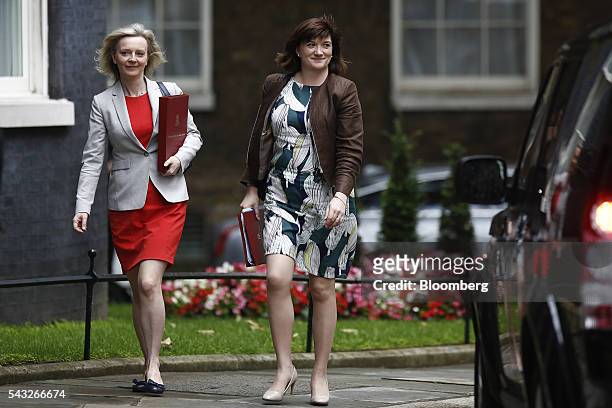 Liz Truss, U.K. Environment secretary, left, and Nicky Morgan, U.K. Education secretary, arrive for a cabinet meeting in Downing Street in London,...