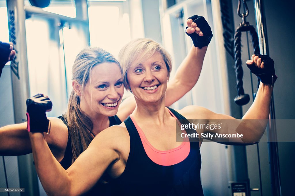 Two Women exercising in the gym