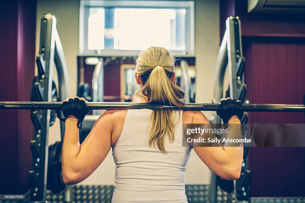 Woman exercising in the gym