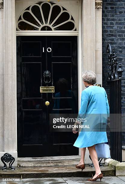 British Home Secretary Theresa May arrives to attend a cabinet meeting at 10 Downing Street in central London on June 27, 2016. European stock...