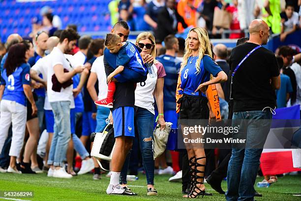 Dimitri Payet of France with his wife Ludivine Payet and one of his sons after the European Championship match Round of 16 between France and...